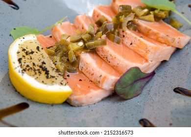 Red Fish Under Holopeño Sauce And Lemon