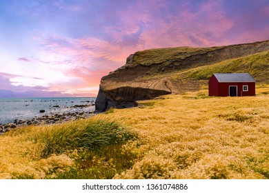 Red Fisherman's Cottage Near The Coast In The Small Village Cameron. Sunset Time. Tierra Del Fuego, Chile