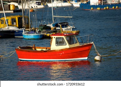 Red Fishing Boat In Cornwall Bay.