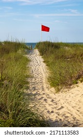 Red Flag Riptide Warning On The Beach