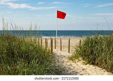 Red Flag Riptide Warning On The Beach