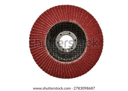 Red flap disc for angle grinder top view. Abrasive sanding wheel with fiberglass backing for metal grinding and weld blending