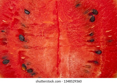 red flesh of watermelon as background close up - Shutterstock ID 1348529360