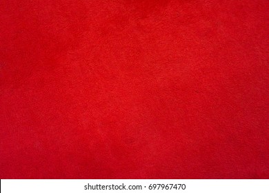 Red floor carpet, solid writing wall paper background.