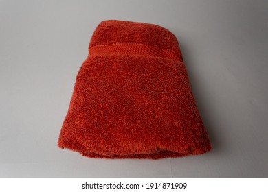 Red Folded Towel On Table