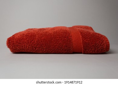 Red Folded Towel On Table