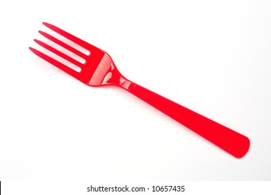 A Red Fork Made Of Plastic