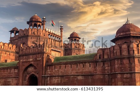 Red Fort Delhi at sunset with moody sky - A UNESCO World heritage site.