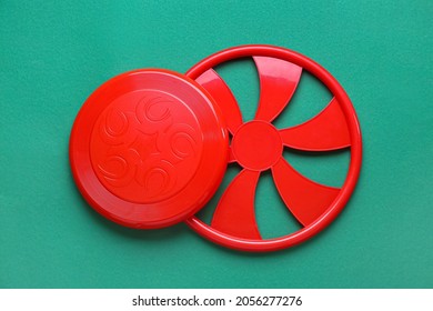 Red Frisbee On Color Background