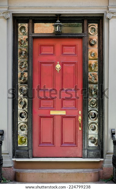 Red Front Door Surrounding Black Door Stock Photo Edit Now