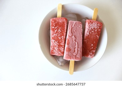 red fruit popsicle. Healthy fruit ice cream. Love popsicle