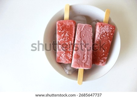 red fruit popsicle. Healthy fruit ice cream. Love popsicle