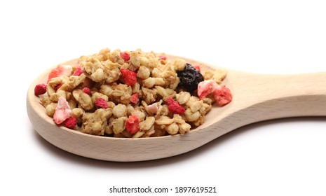 Red fruits cereal mix with wooden spoon, fruity and crunchy muesli with dried raspberry, strawberry, cherry chunks isolated on white background  - Powered by Shutterstock