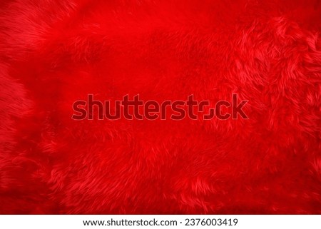 A red fur texture and background for creative design.