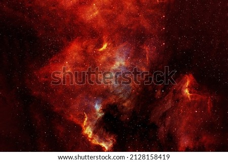 Red galaxy in deep space. Elements of this image were furnished by NASA.. High quality photo