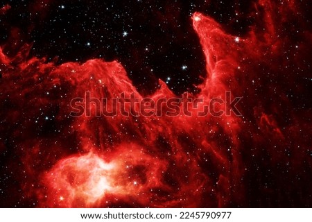 Red galaxy in deep space. Elements of this image were furnished by NASA. High quality photo