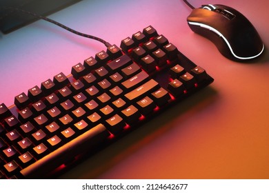 Red gaming keyboard. Keyboard with mouse, neon light. Mechanical keyboard with Red light. gaming concept. programming concept. - Shutterstock ID 2124642677