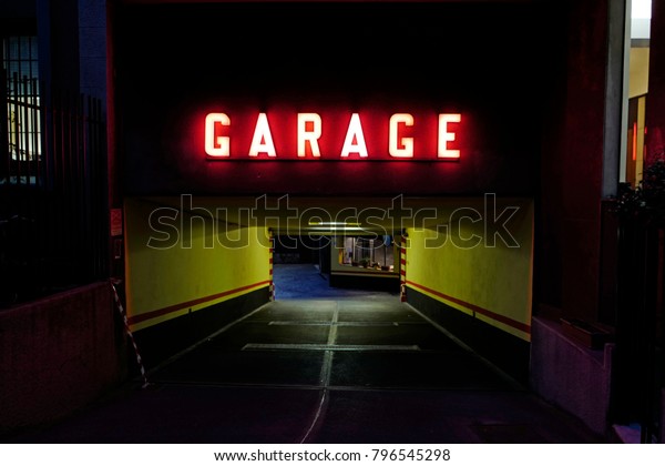 red garage light\
illuminated at night