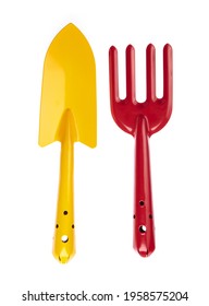 Red Garden Rake And Yellow Trowel Isolated On White Background