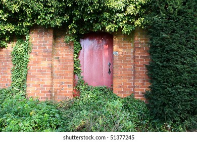 Red Gate Leading To A Secret Garden