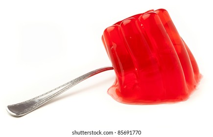 Red Gelatin Closeup On A White Background