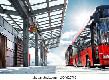 Red German Public Bus On Country Side Bus Station In Low Angle Perspective Waiting