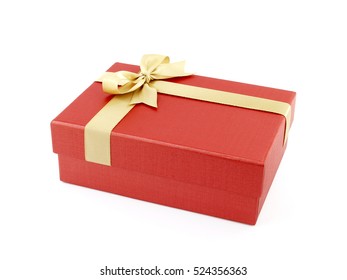 red gift box with golden ribbon bow isolated on white background