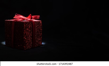 Red Gift Box On Black Background