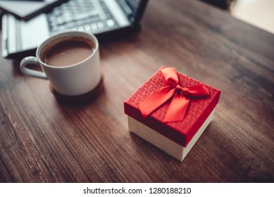Red Gift Box On The Office Desk