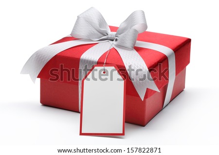 Red gift box with silver bow and tag