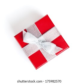 Red Gift Box With Silver Ribbon. Isolated On White Background. View From Above