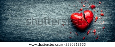 Red Glass Heart Laying Broken On Cold Stone Floor - Relationship Issues Concept  Foto d'archivio © 
