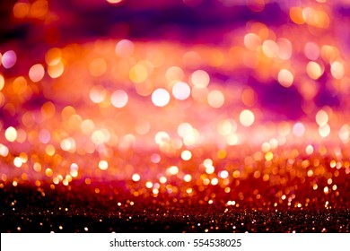 roter, glitzernder abstrakter Hintergrund mit Bokeh-De-Fokus-Lichter-Weihnachten