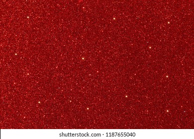 Red Glitter Lights Background. Defocused