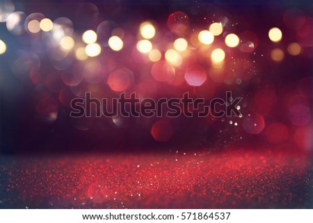 Red glitter vintage lights background. defocused