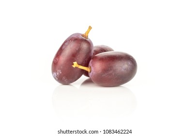 Red globe grape stack three berries isolated on white background