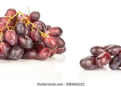 Red globe grape two clusters isolated on white background shiny deep pink berries