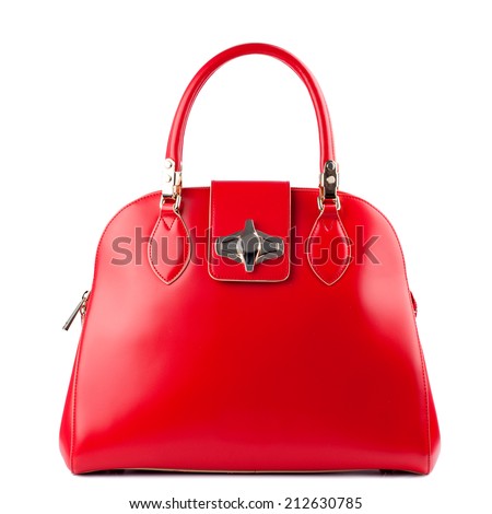 Red glossy female leather bag isolated on white background