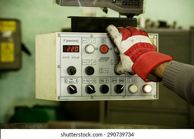 red glove and control panel - Powered by Shutterstock