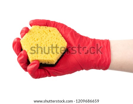 Red gloves and sponge on white background