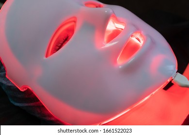 Red Glowing Cosmetology Mask For Phototherapy At The Spa