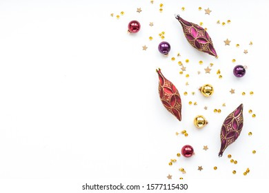 Red and gold christmas decorations on white background, flat lay, top view - Shutterstock ID 1577115430