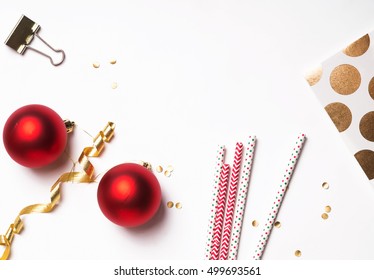 Red and gold color Christmas and New Year decor on the white. Top view