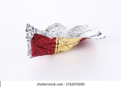 Red And Gold Empty Candy Wrapper Isolated On White Background With Copy Space For Your Text