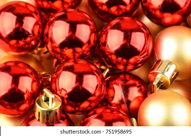 Red and golden  Christmas baubles, close up - Shutterstock ID 751958695