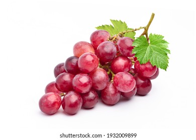 Red grape with leaves isolated on white background.