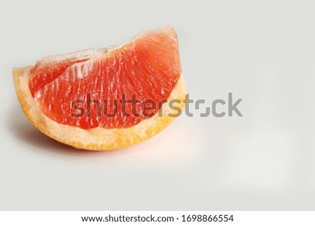 Similar – grinse-Grapefruit