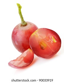 Red Grapes. Cut On Segments Grapes Berry. It Is Isolated On A White Background