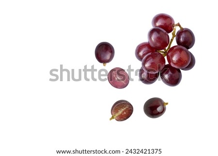 Red grapes fruit with half slice isolated on white background. Top view. Flat lay. Grape pattern texture background. 