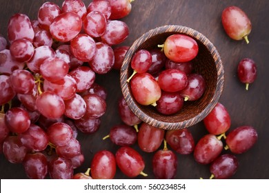 Red Grapes On Wooden Table - Vintage Filter.